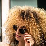 A female model sporting Bolle Navis sunglasses